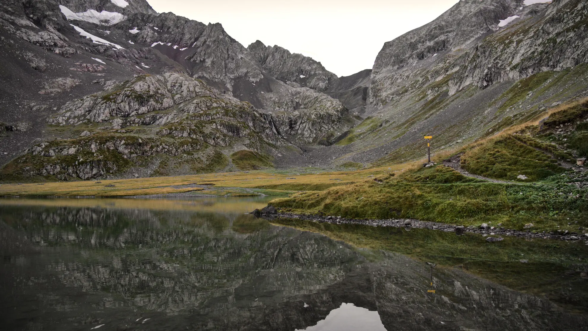 Reflections on Lac de la Muzelle, autumn atmosphere